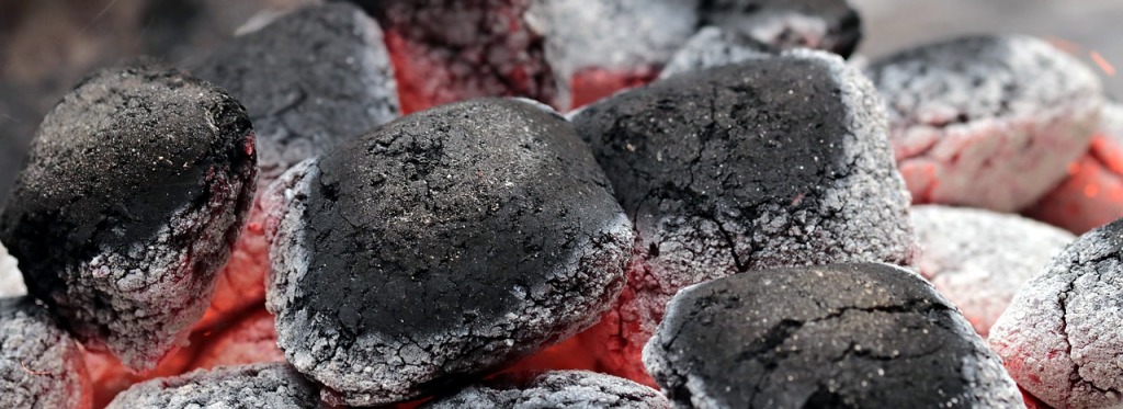Red hot charcoal briquettes. 